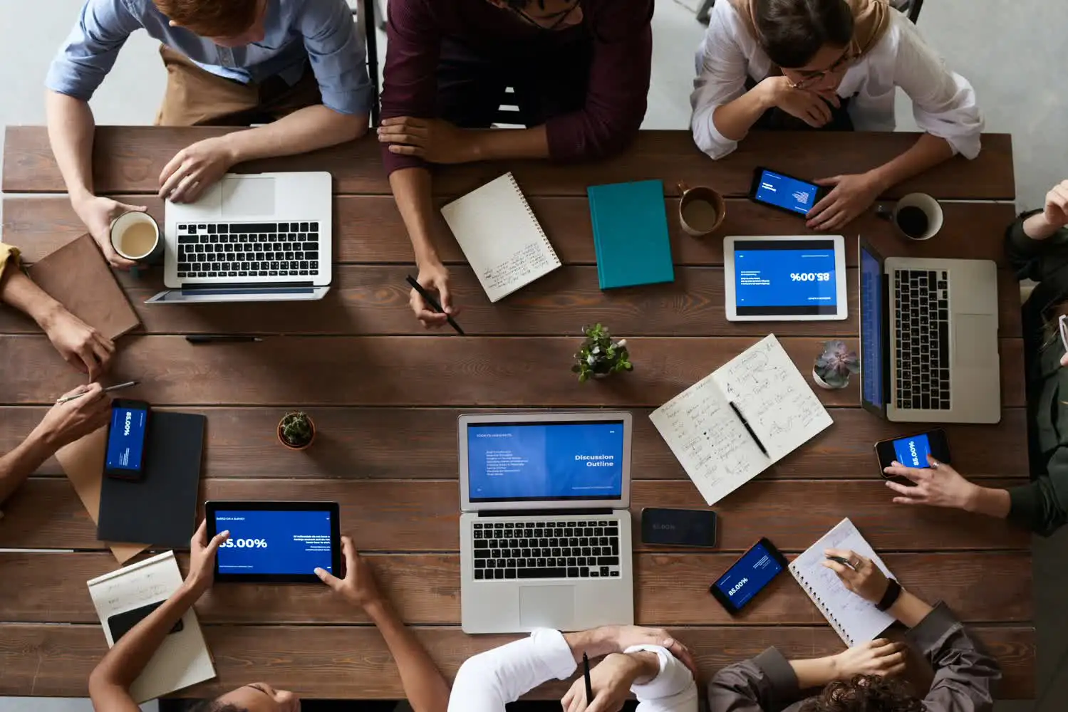 Team meeting with laptops